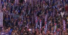 People holding signs that say "VOTE"