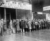 Photo of people in a breadline during the Great Depression